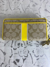 Load image into Gallery viewer, COACH Accordian Zip Wallet in Signature Logo - Yellow Stripe/Taupe
