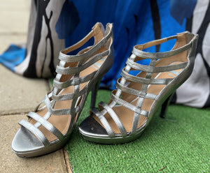 SILVER FERGALICIOUS BY FERGIE STRAPPY PLATFORMS: Size: 8.5 (Imperfect)