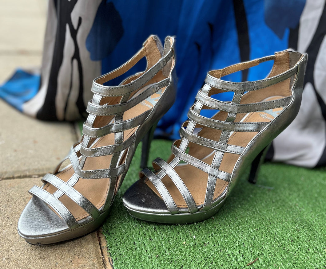 SILVER FERGALICIOUS BY FERGIE STRAPPY PLATFORMS: Size: 8.5 (Imperfect)